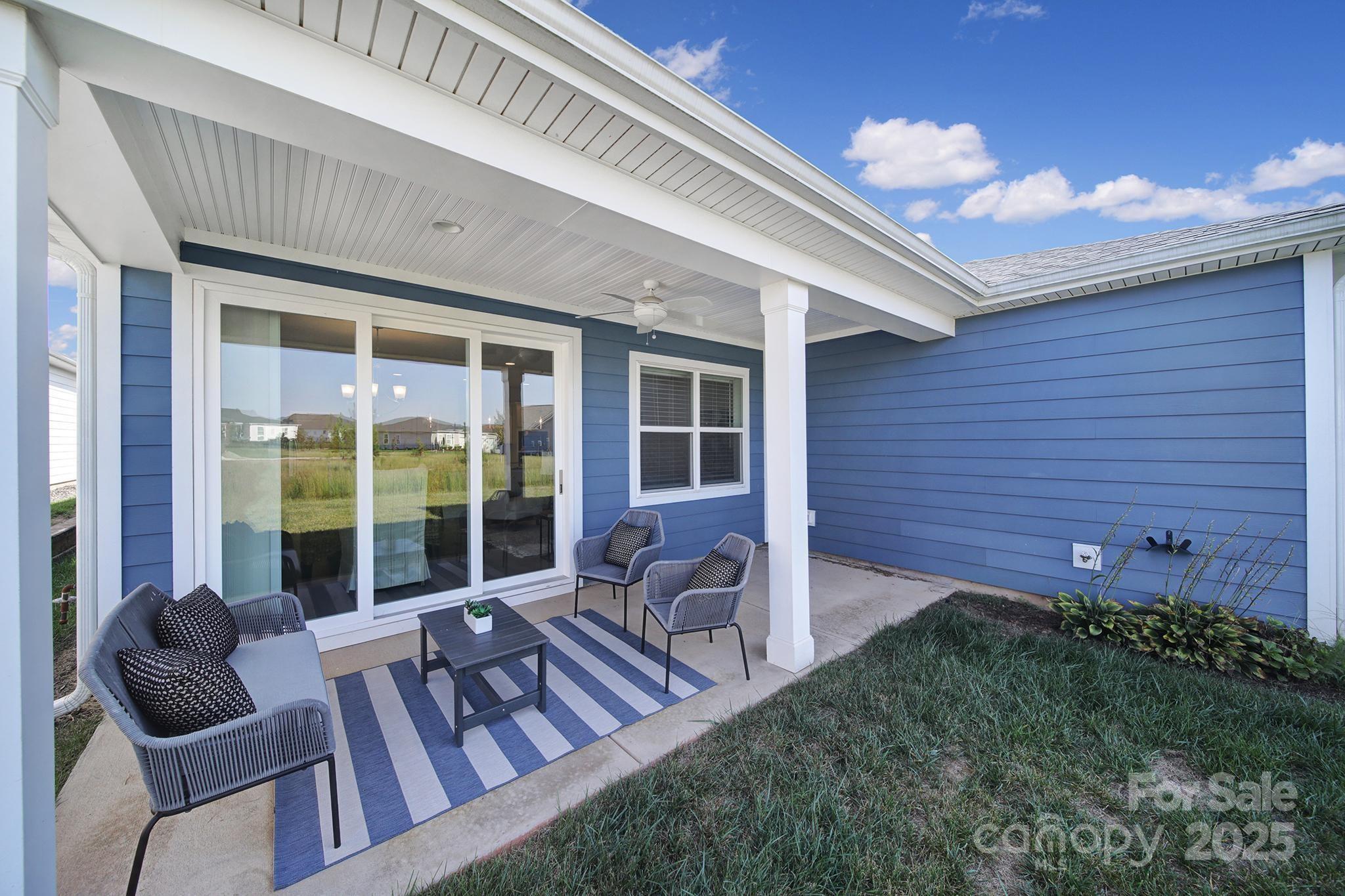 6255 Scuttle Lane, Unit 1104 Denver, NC 28037 - Photo 25 of 45 a view of backyard with patio