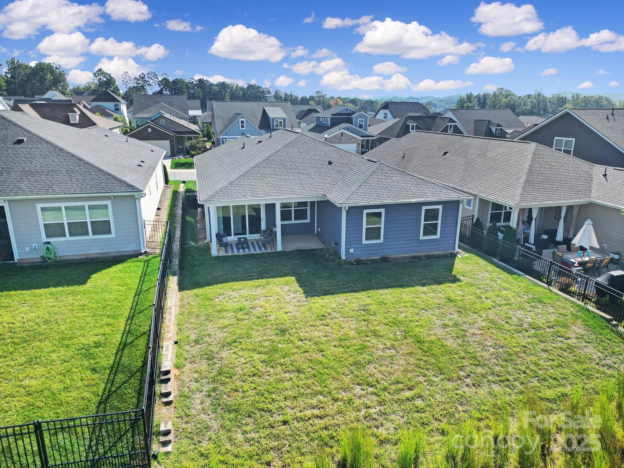6255 Scuttle Lane, Unit 1104 Denver, NC 28037 - Photo 31 of 45 a view of a house with a big yard
