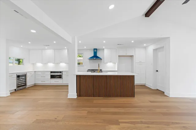 a view of kitchen with wooden floor