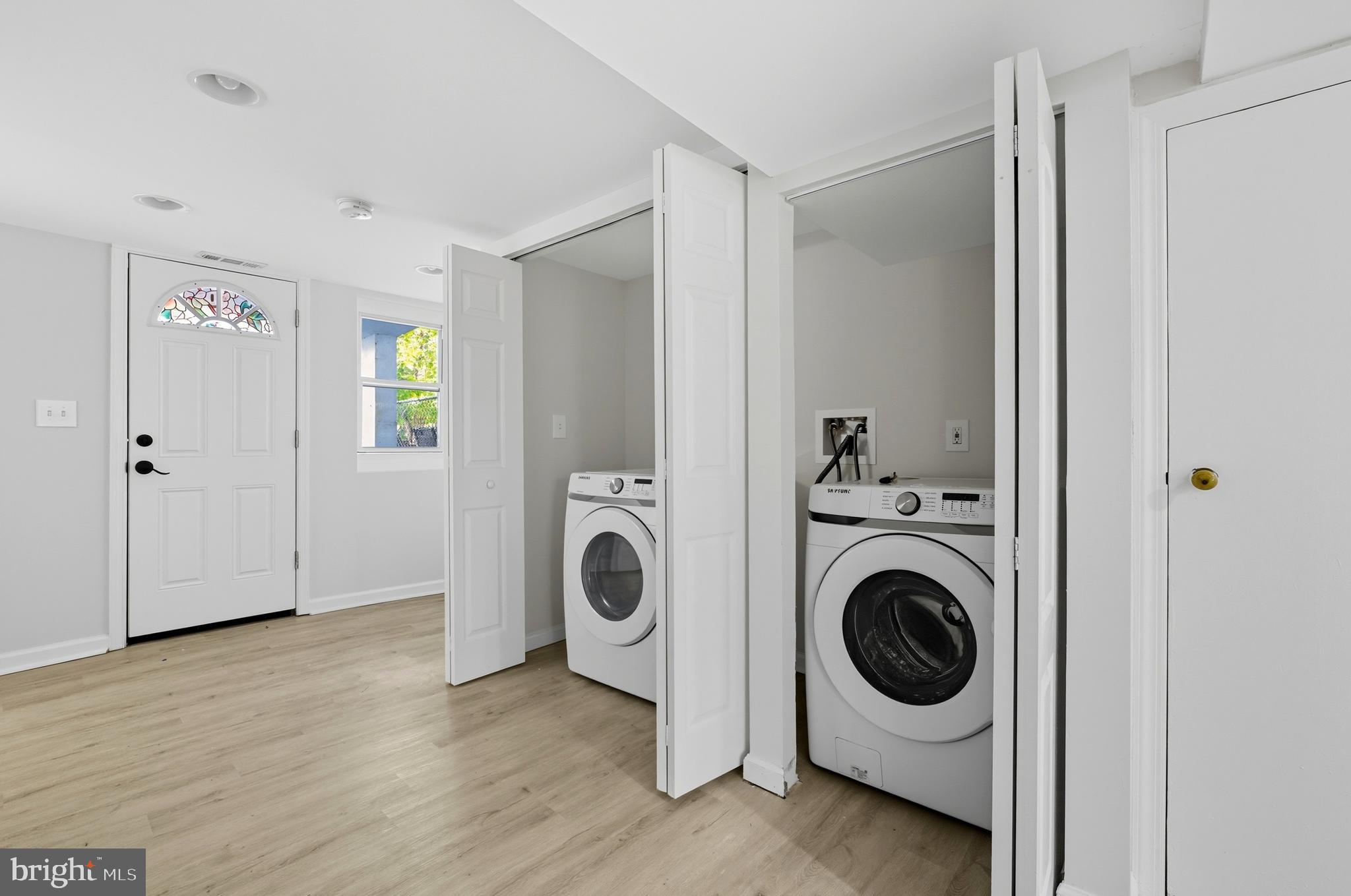 5768 Maplehill Road Baltimore, MD 21239 - Photo 14 of 29 a utility room with dryer and washer