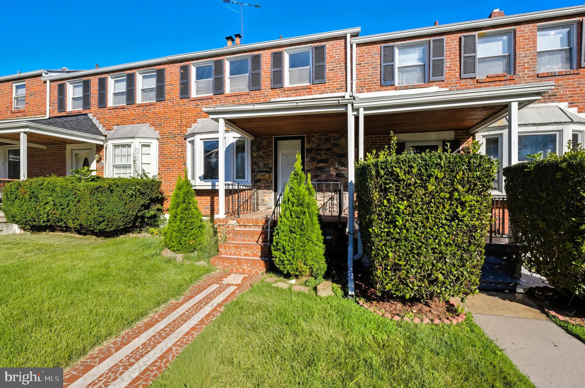 5768 Maplehill Road Baltimore, MD 21239 - Photo 28 of 29 front view of a house with a yard