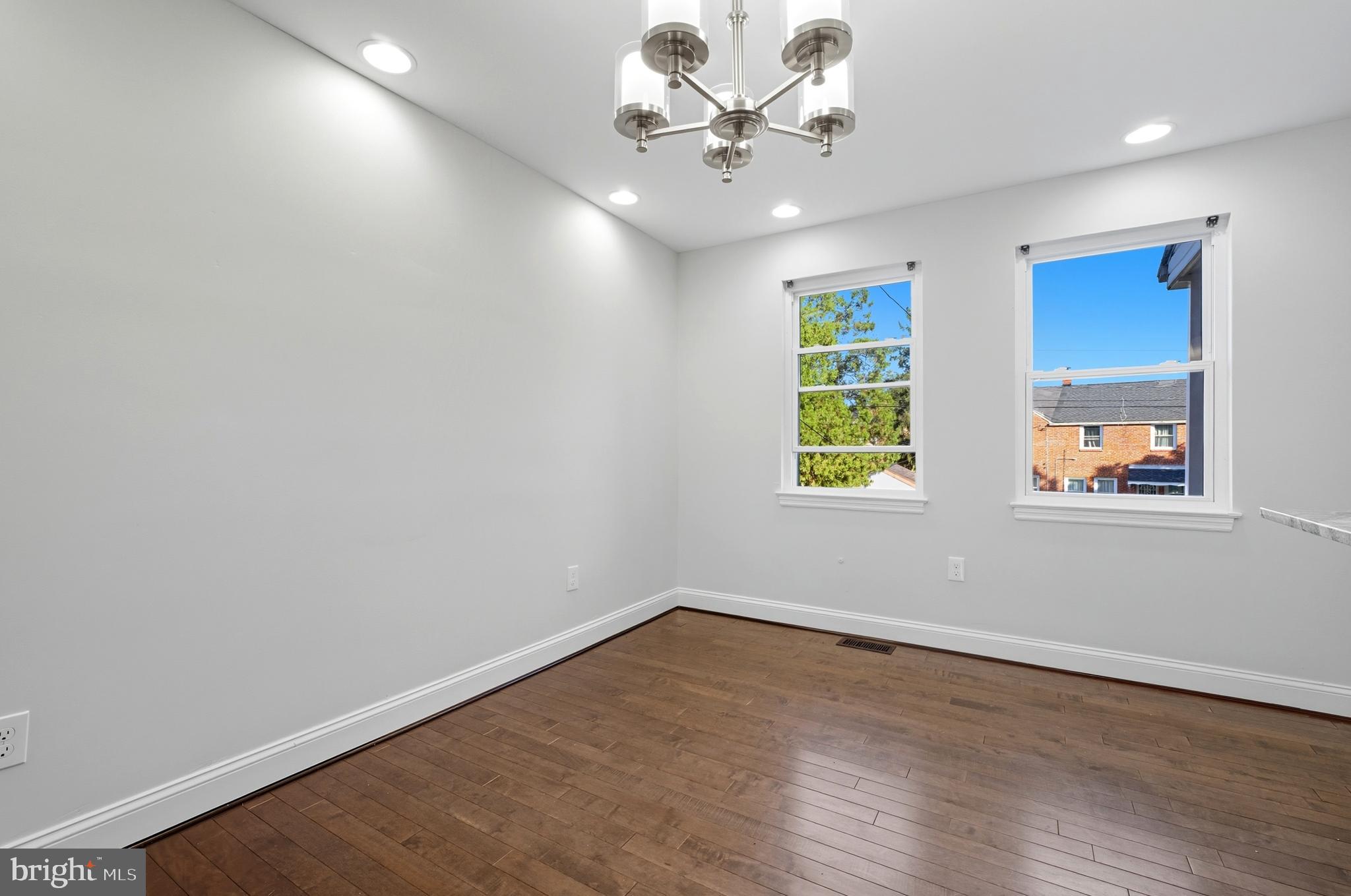 5768 Maplehill Road Baltimore, MD 21239 - Photo 7 of 29 a view of an empty room with a window