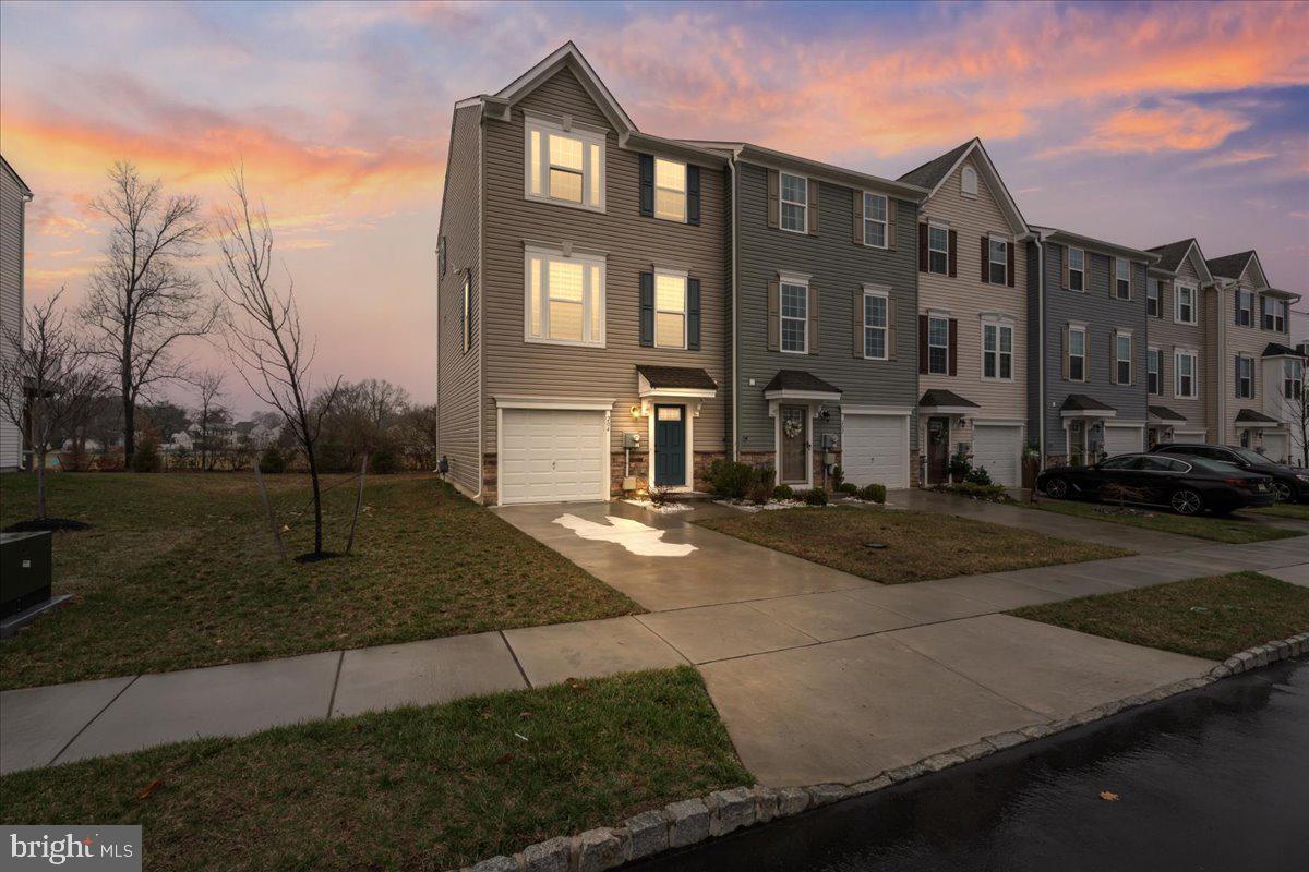 204 Freedom Way Sicklerville, NJ 08081 - Photo 22 of 32 a front view of a house with a yard