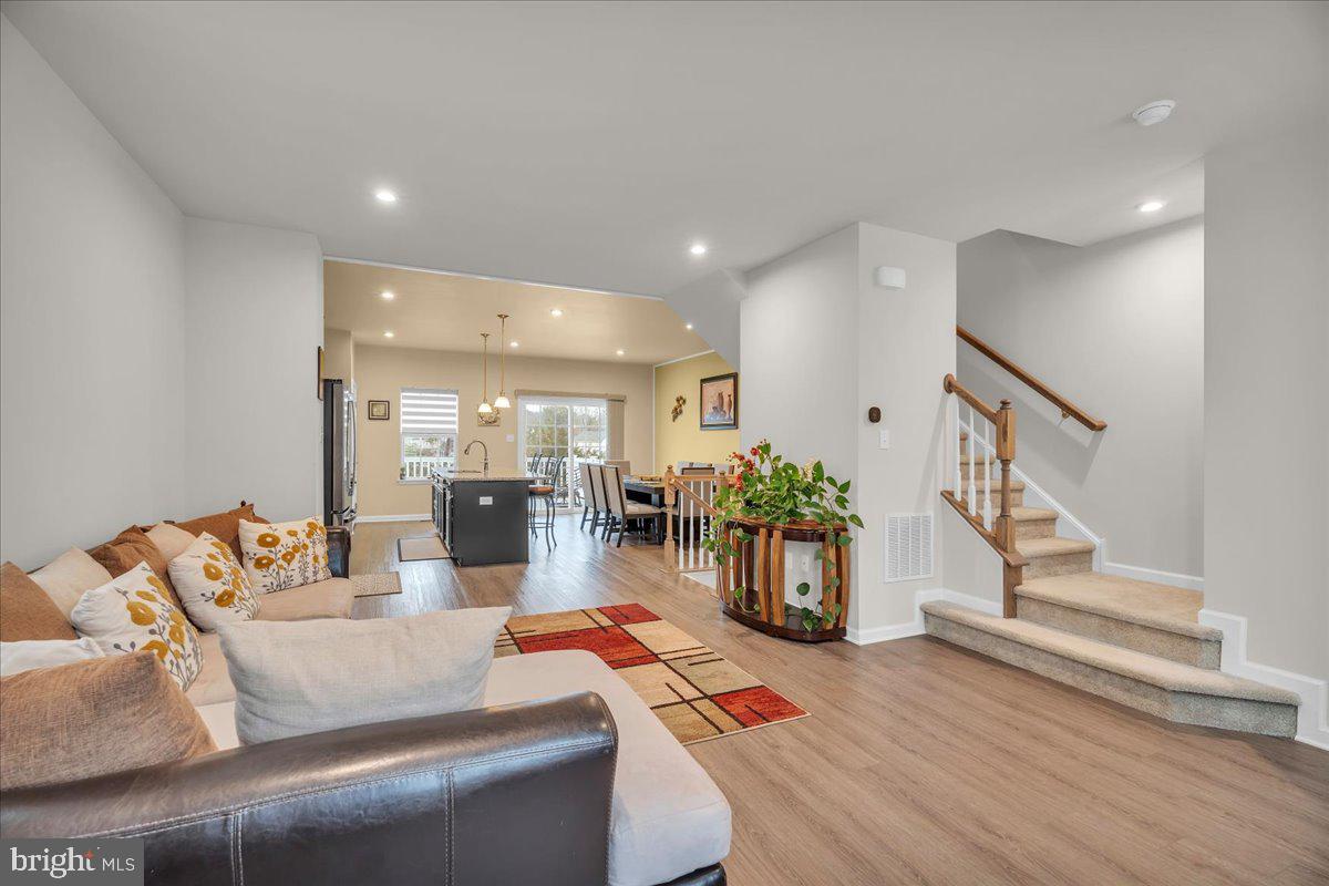 204 Freedom Way Sicklerville, NJ 08081 - Photo 5 of 32 a living room with furniture and wooden floor