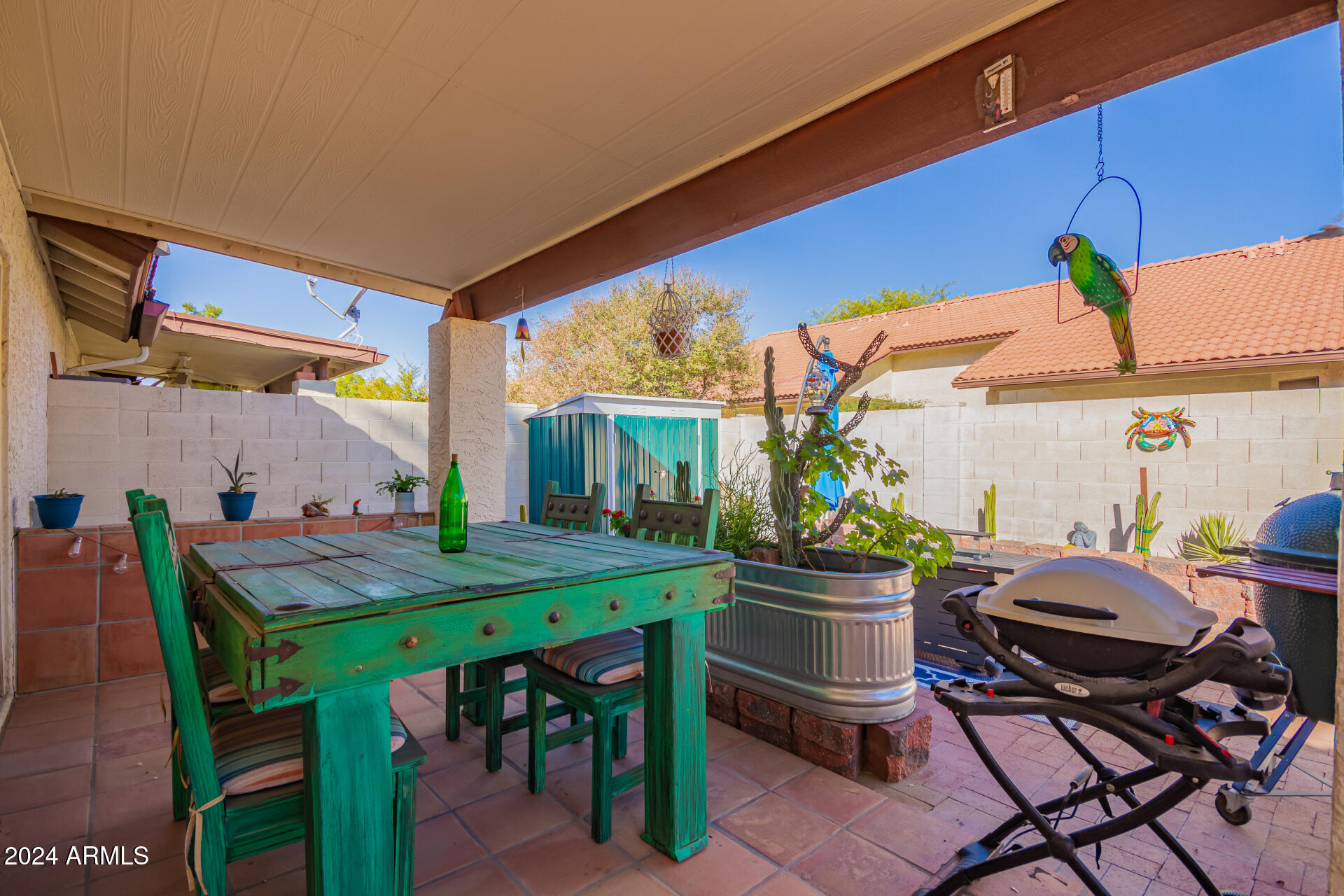 542 South Higley Road, Unit 73 Mesa, AZ 85206 - Photo 18 of 34 a dining room filled with furniture and a potted plant