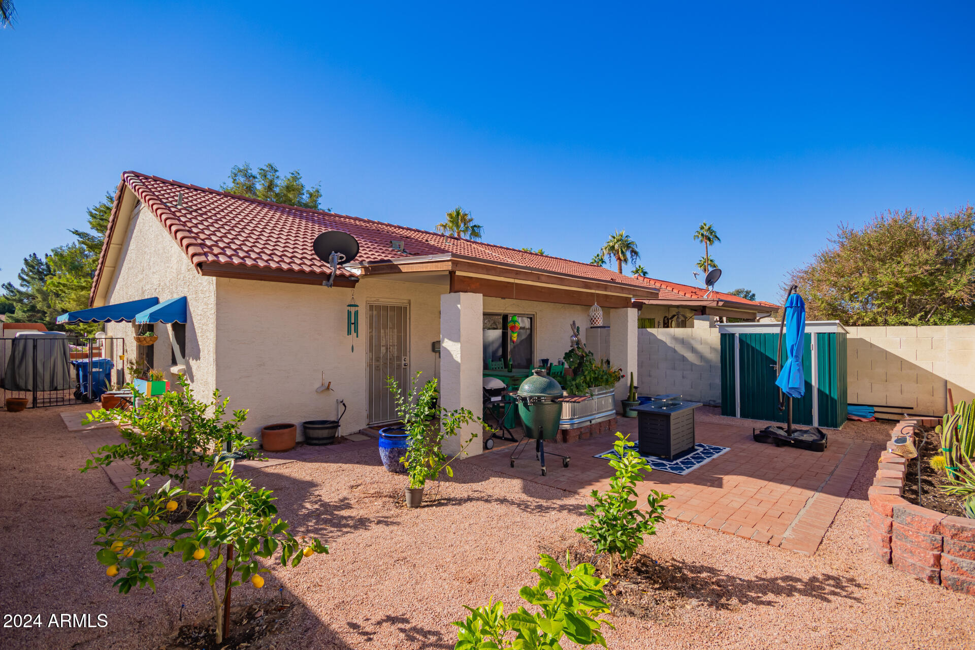 542 South Higley Road, Unit 73 Mesa, AZ 85206 - Photo 19 of 34 a front view of house with yard outdoor seating and entertaining space
