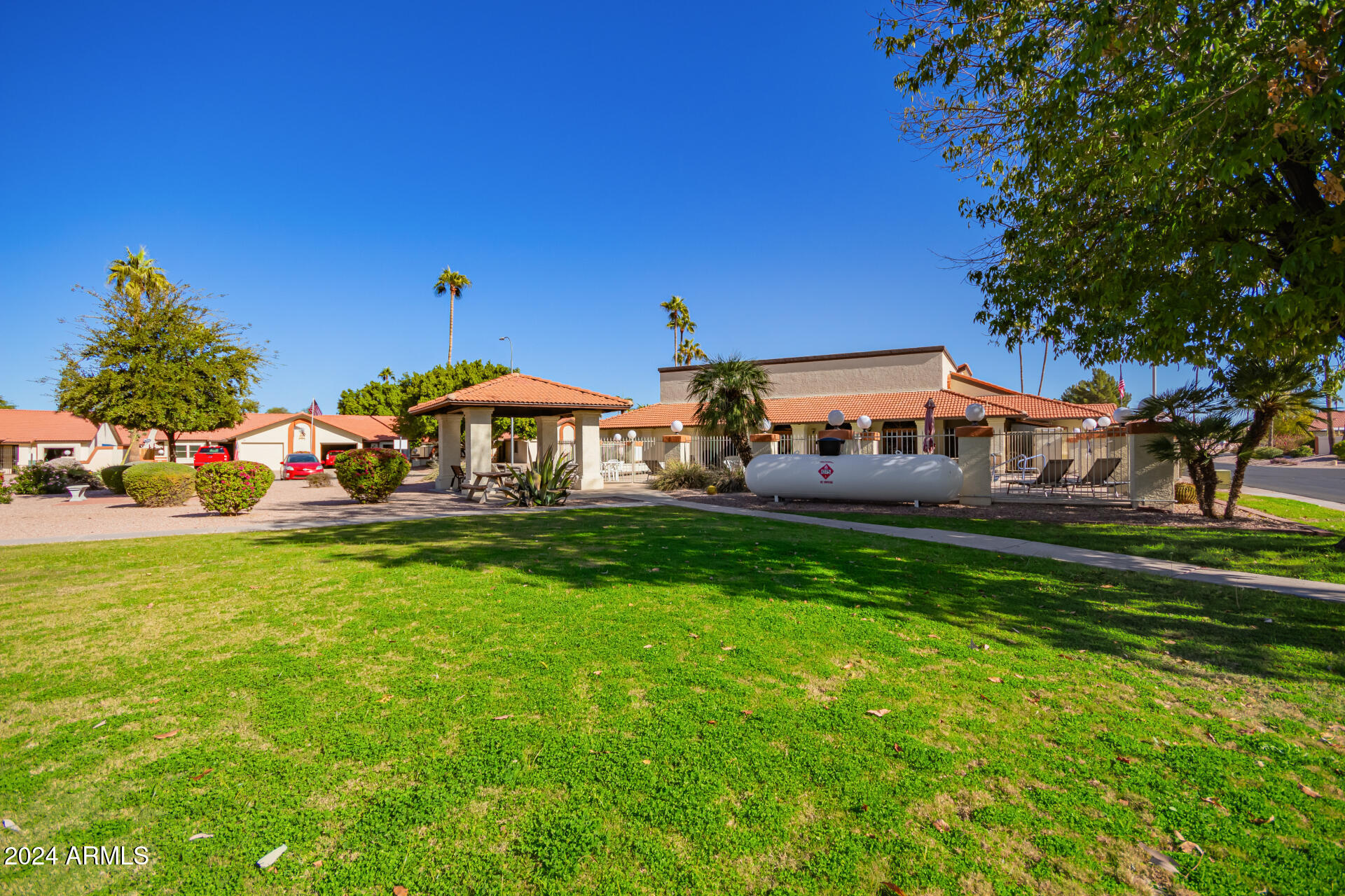 542 South Higley Road, Unit 73 Mesa, AZ 85206 - Photo 26 of 34 a front view of house with yard and outdoor seating