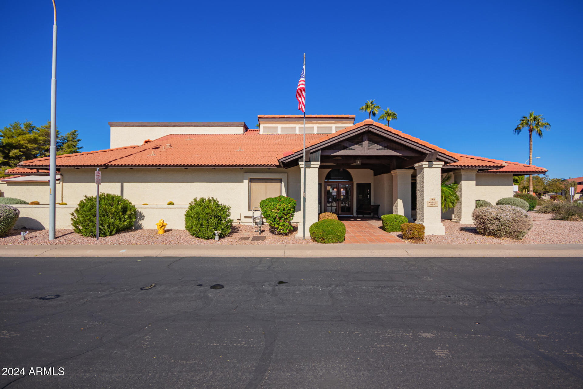 542 South Higley Road, Unit 73 Mesa, AZ 85206 - Photo 33 of 34 a front view of a house with a yard