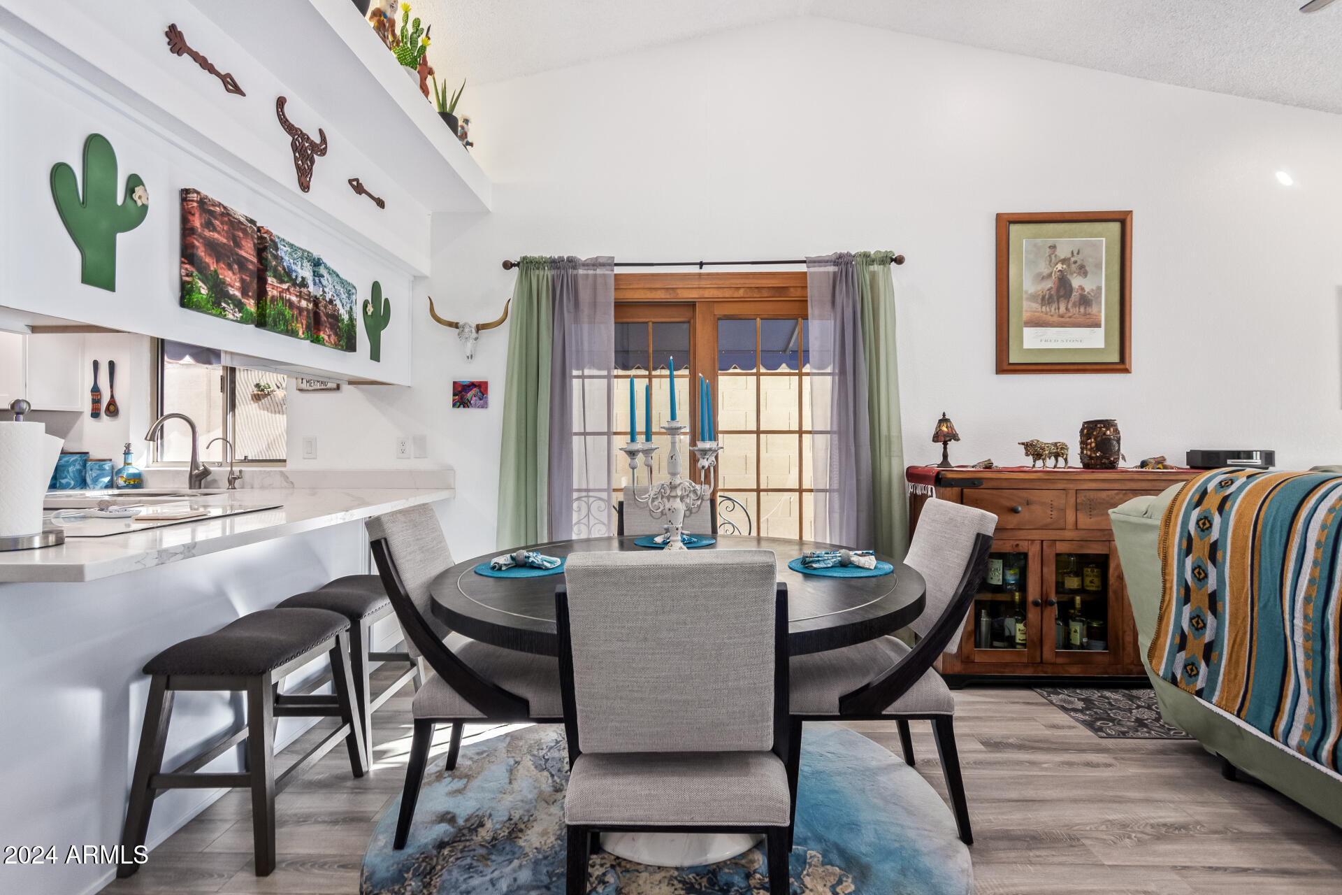 542 South Higley Road, Unit 73 Mesa, AZ 85206 - Photo 6 of 34 a view of a dining room with furniture and a window