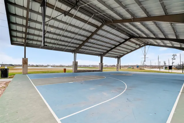 a view of a swimming pool with a porch