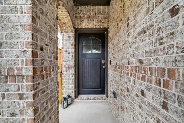 a front view of a house with a door