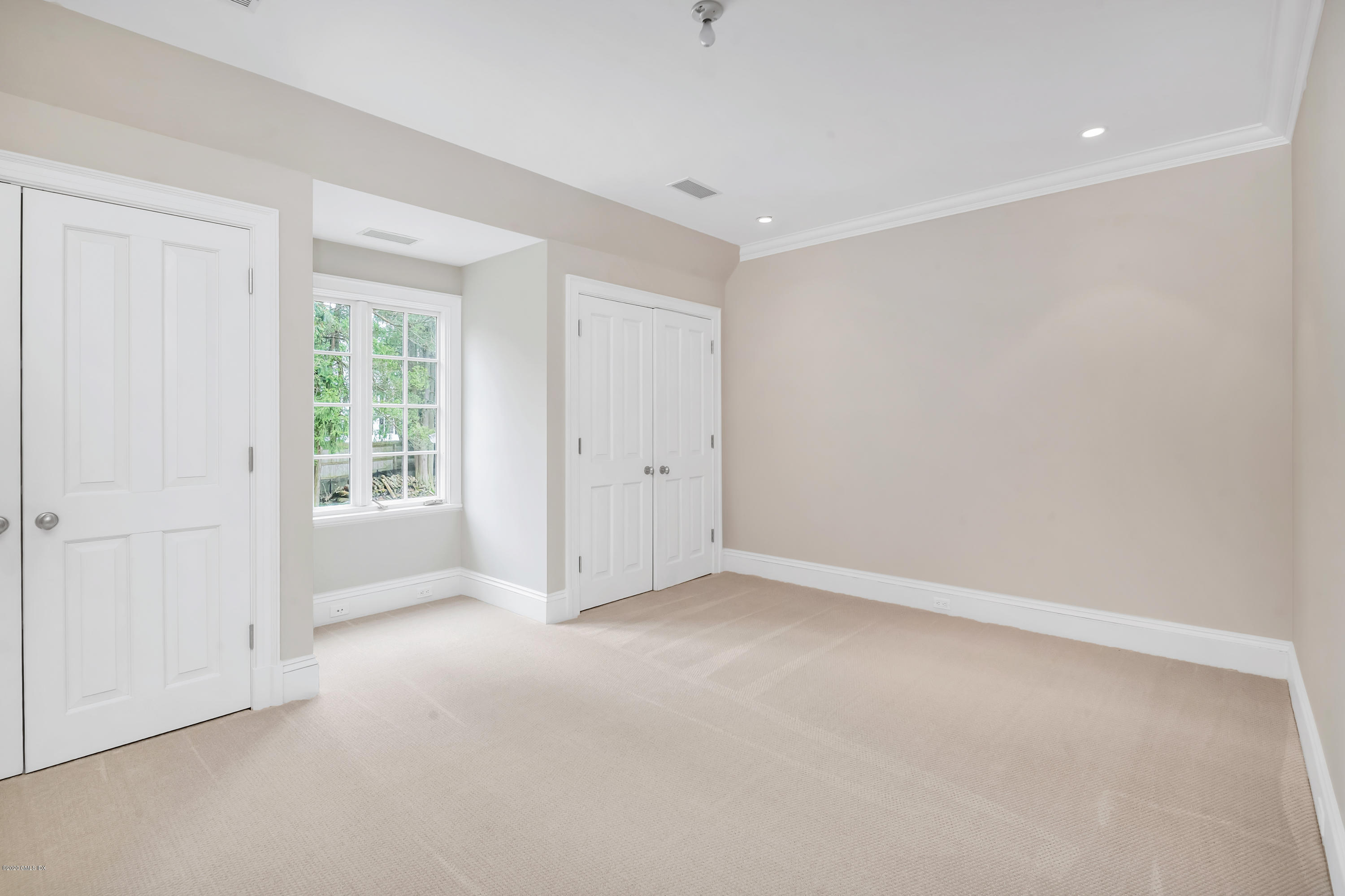 397 Riversville Road Greenwich, CT 06831 - Photo 15 of 21 a view of an empty room with a window