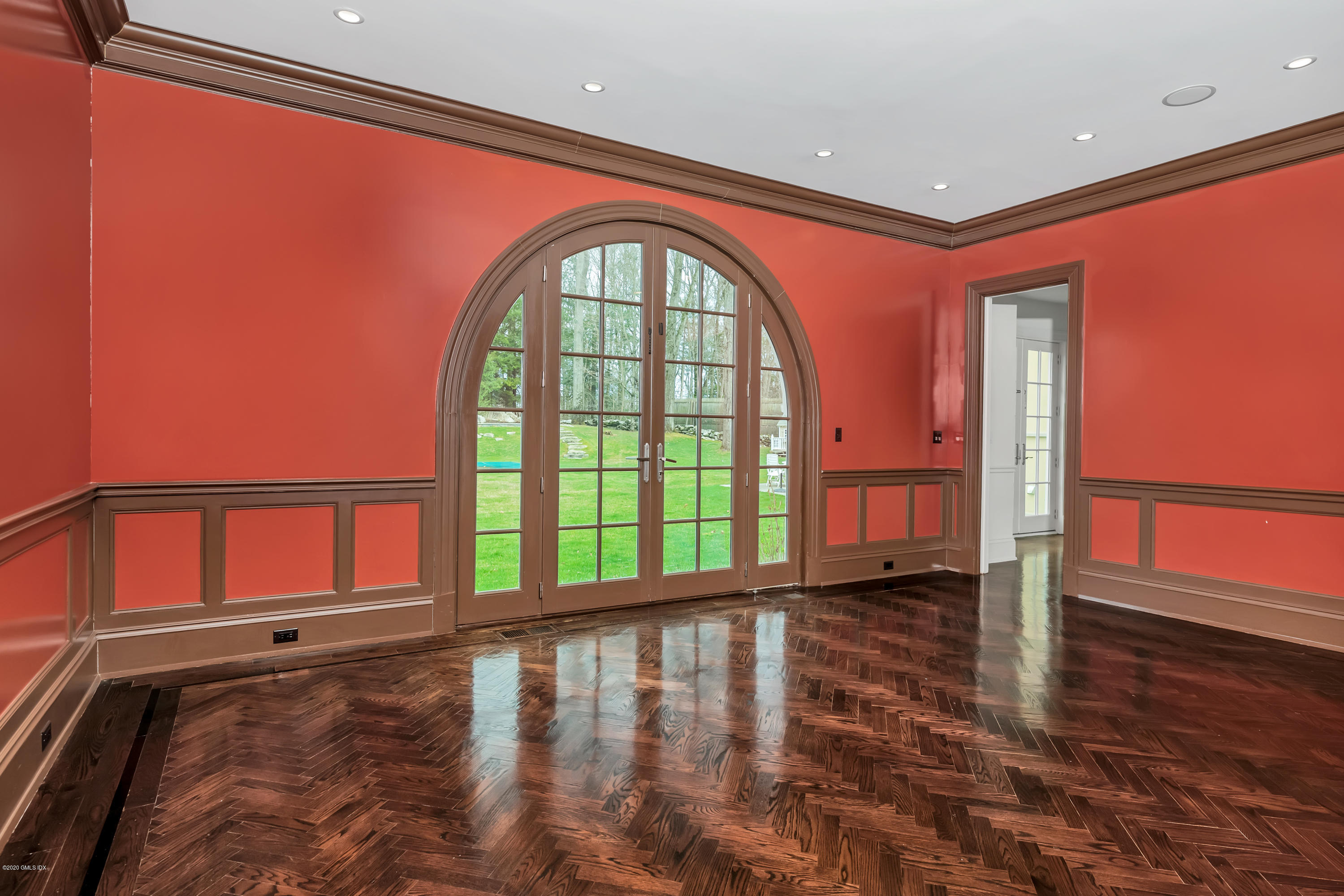 397 Riversville Road Greenwich, CT 06831 - Photo 5 of 21 wooden floor in an empty room with a window