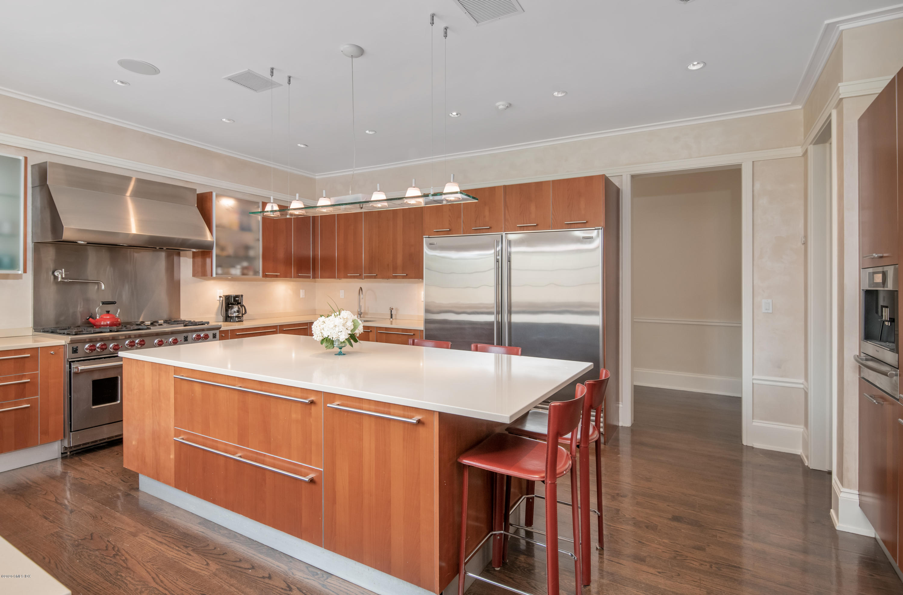 397 Riversville Road Greenwich, CT 06831 - Photo 6 of 21 a kitchen with stainless steel appliances granite countertop a sink and cabinets