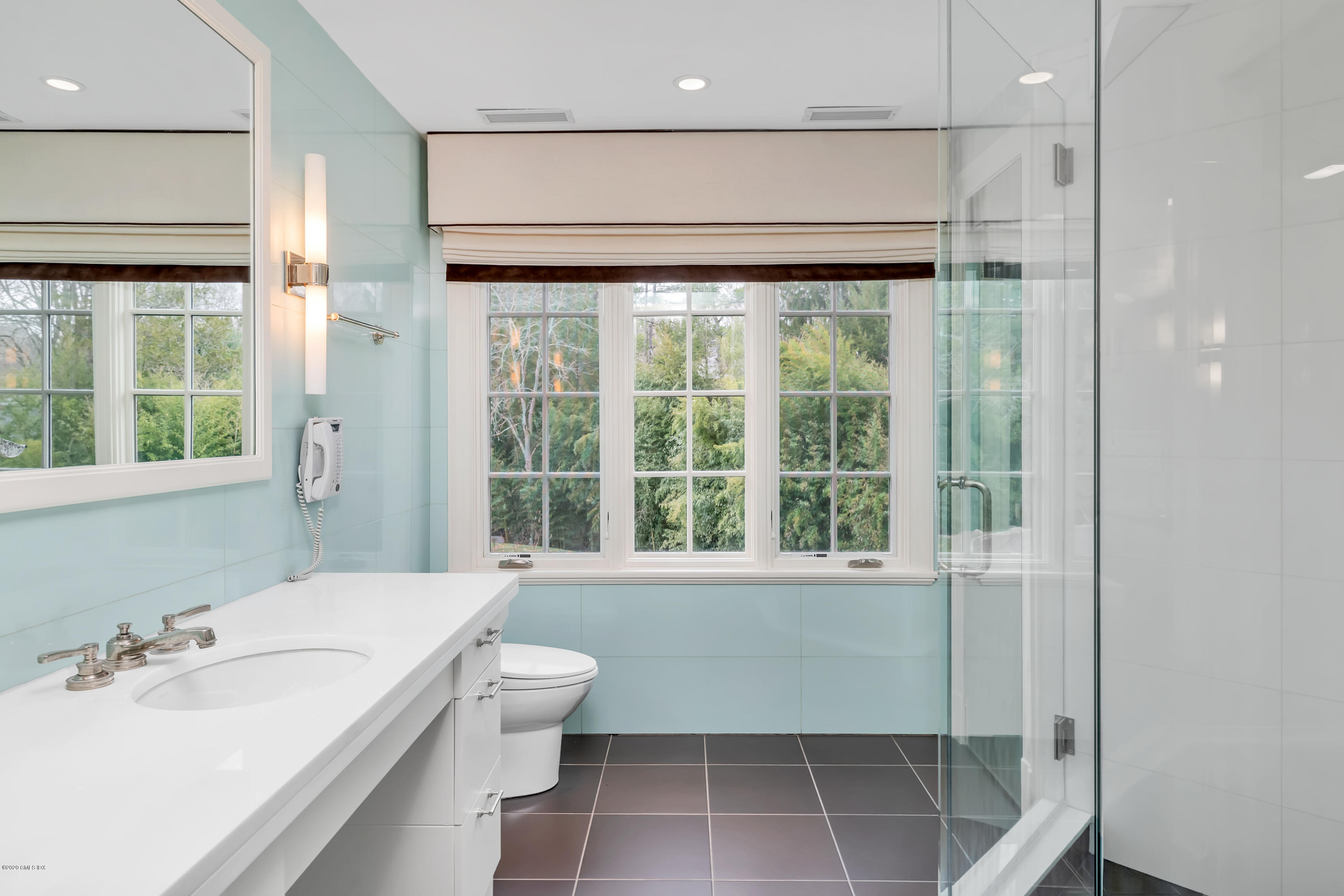 397 Riversville Road Greenwich, CT 06831 - Photo 10 of 21 a bathroom with a sink and a toilet