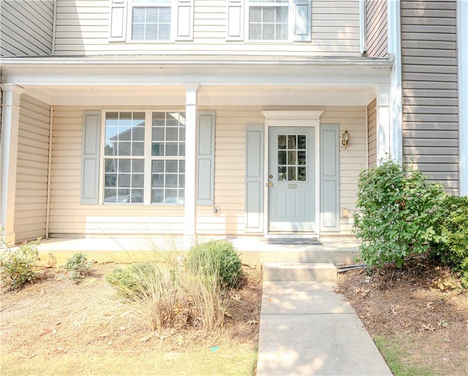 4645 Valais Court, Unit 109 Alpharetta, GA 30022 - Photo 2 of 27 front view of a house