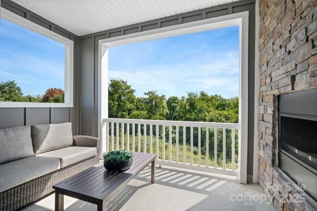 a view of a two chairs in the roof deck