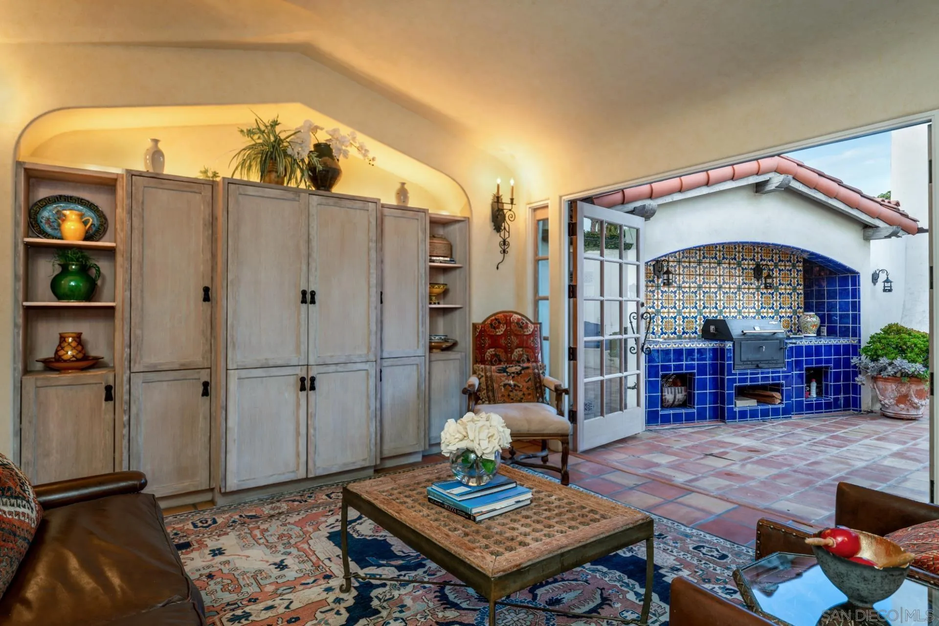 6174 El Tordo Rancho Santa Fe, CA 92067 - Photo 12 of 58 a living room with furniture a dining table and a fireplace