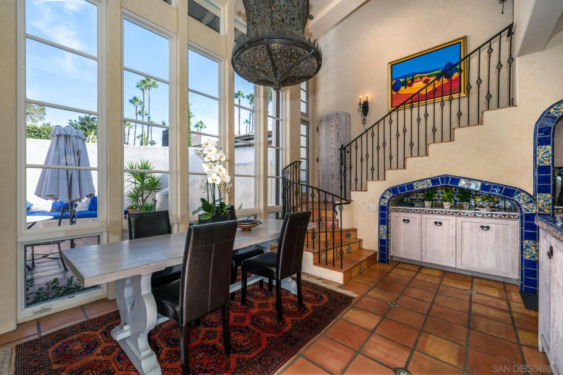 6174 El Tordo Rancho Santa Fe, CA 92067 - Photo 20 of 58 a dining room with furniture and large windows