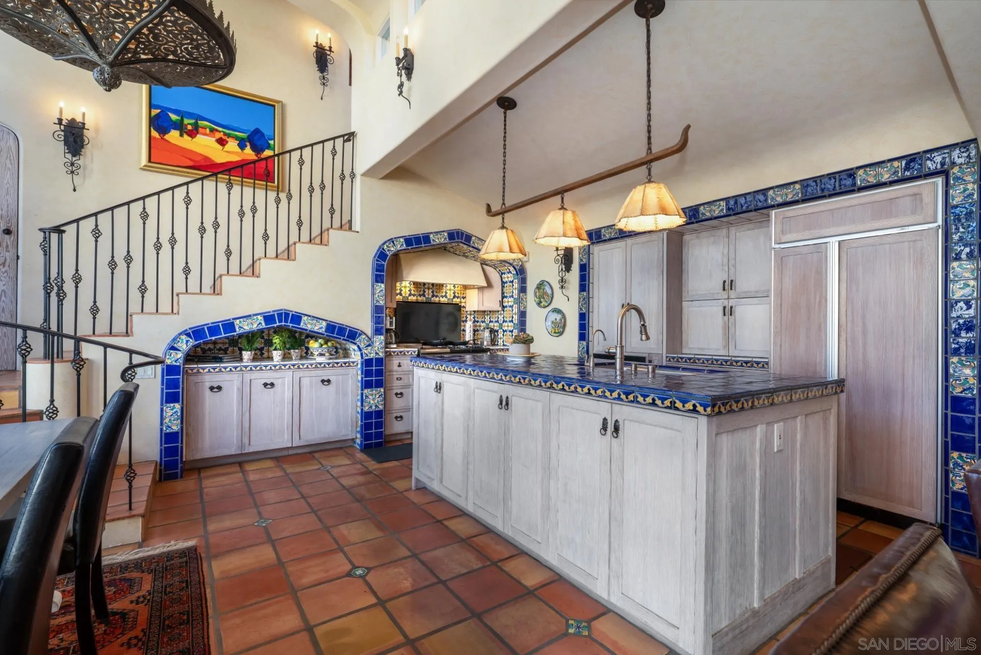 6174 El Tordo Rancho Santa Fe, CA 92067 - Photo 21 of 58 a kitchen with granite countertop a stove a sink and dishwasher