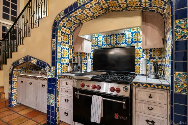 a view of hall way with furniture