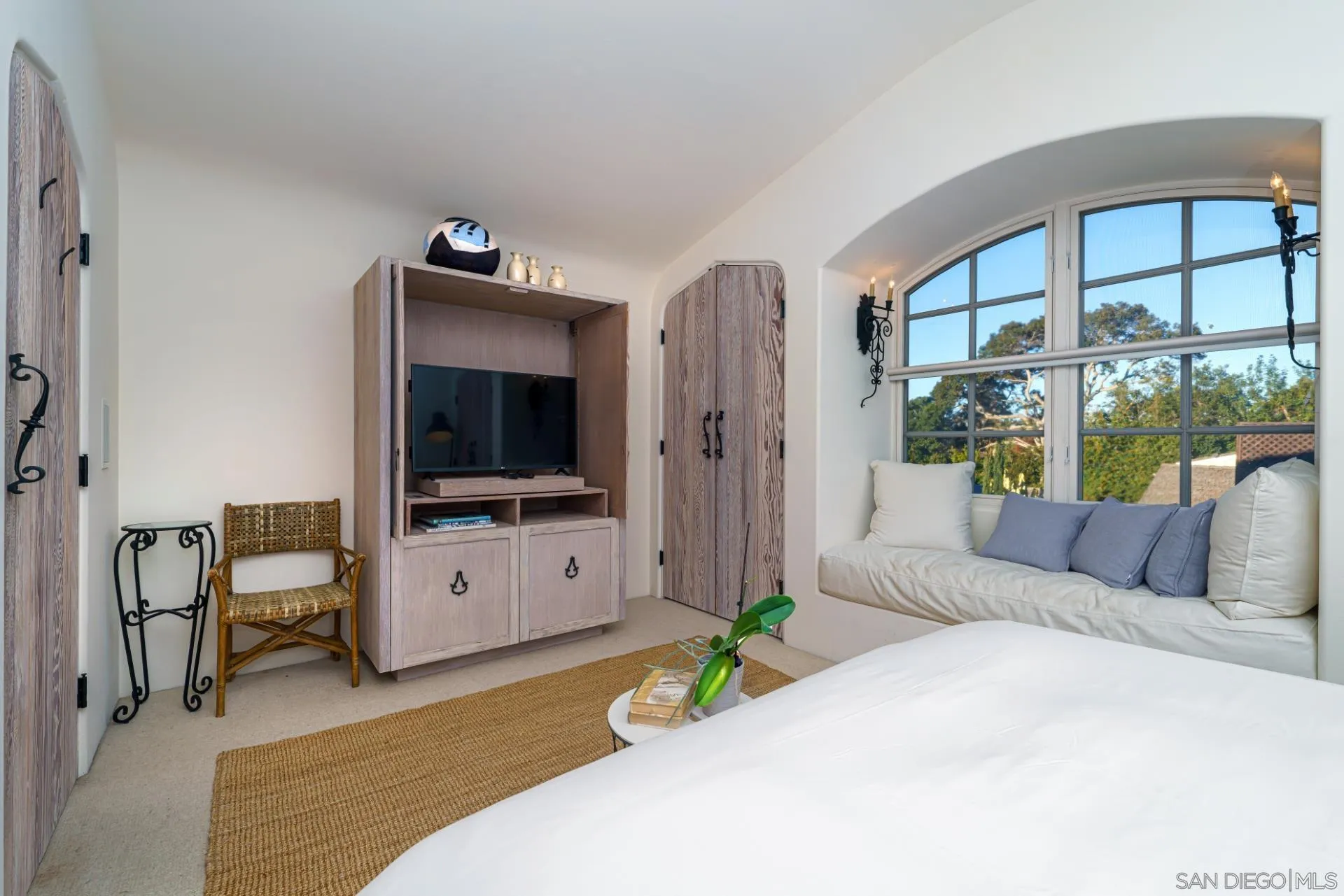 6174 El Tordo Rancho Santa Fe, CA 92067 - Photo 41 of 58 a living room with furniture and a flat screen tv