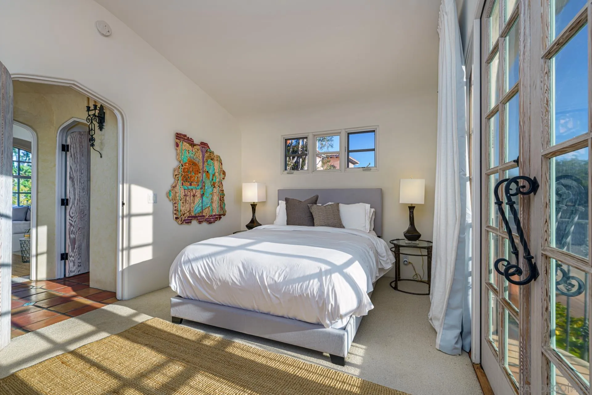 6174 El Tordo Rancho Santa Fe, CA 92067 - Photo 45 of 58 a spacious bedroom with a bed and a cabinets