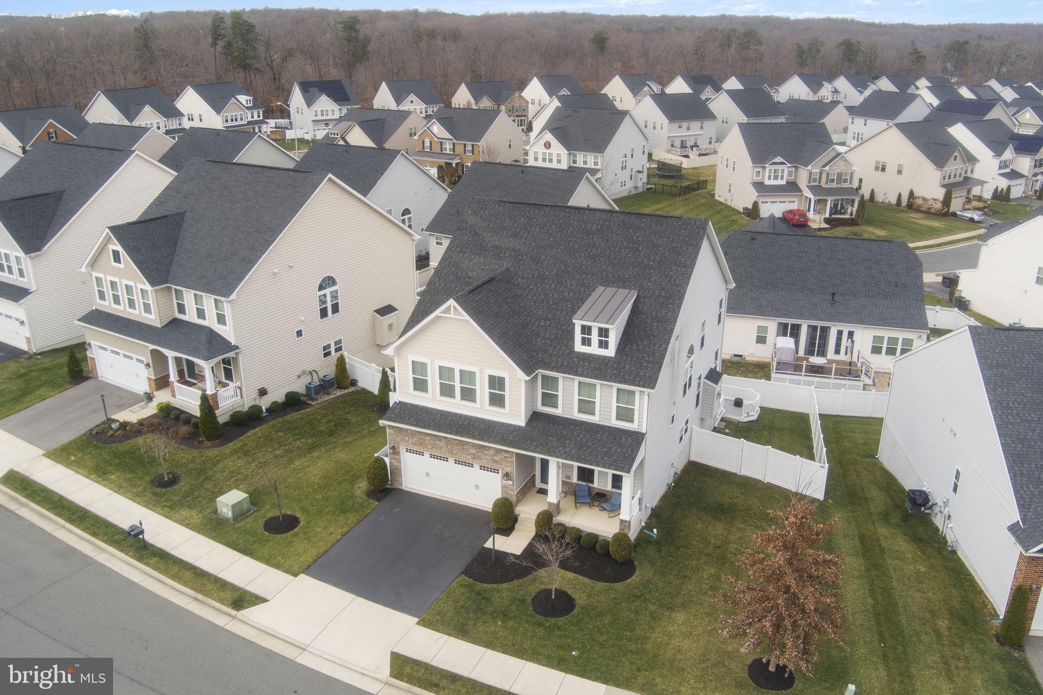 12432 Mays Quarter Road Woodbridge, VA 22192 - Photo 5 of 94 an aerial view of residential house with outdoor space