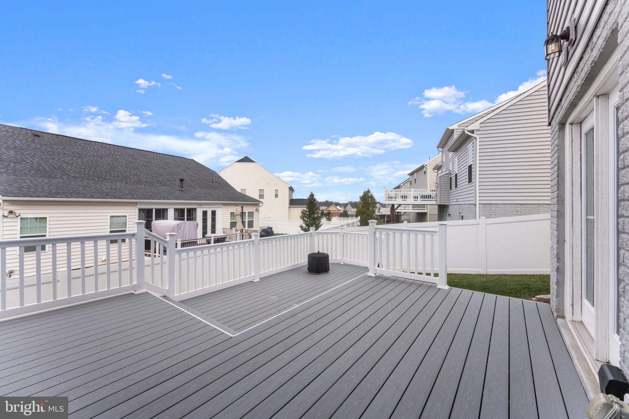 12432 Mays Quarter Road Woodbridge, VA 22192 - Photo 79 of 94 a view of a terrace with wooden floor and city view
