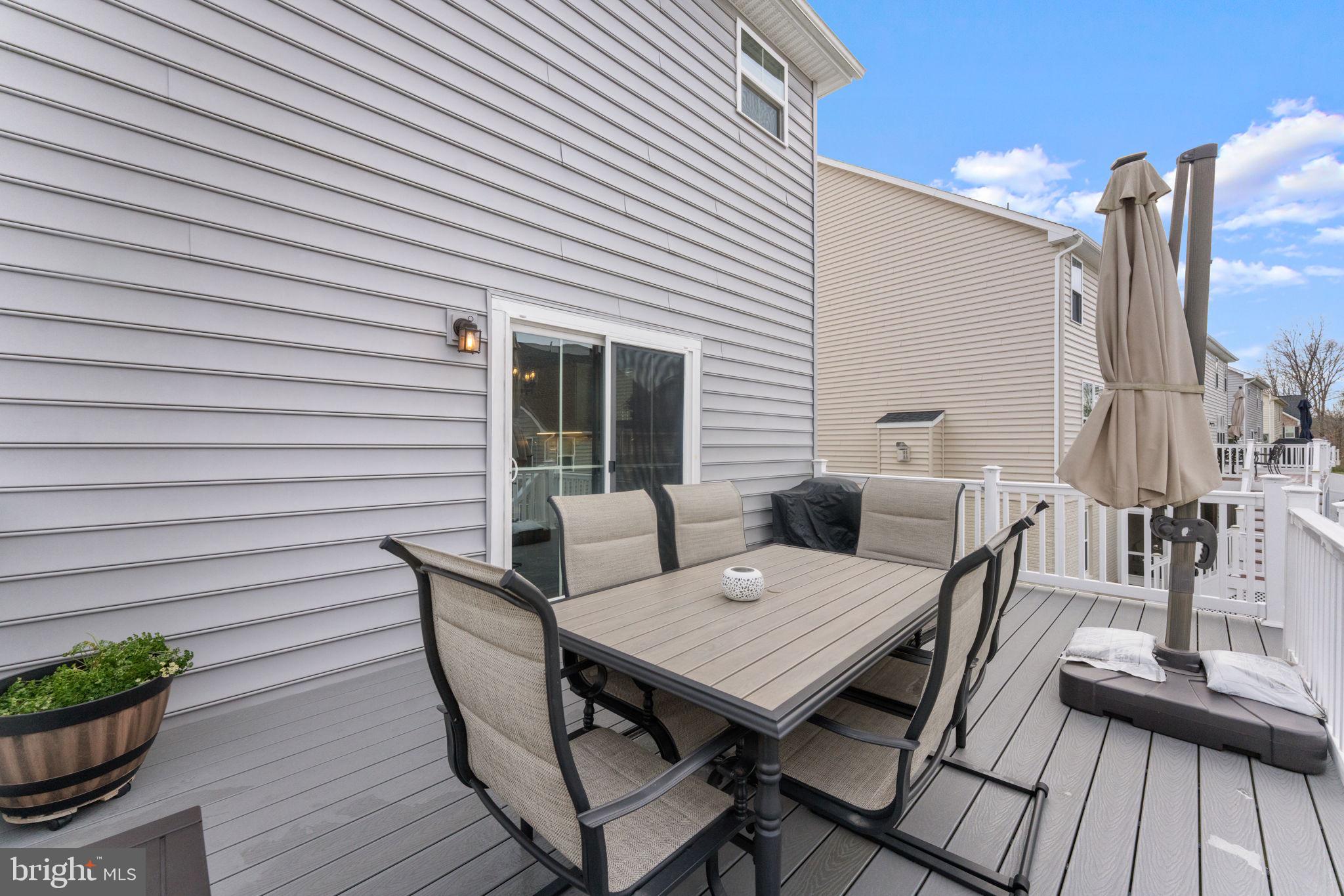 12432 Mays Quarter Road Woodbridge, VA 22192 - Photo 80 of 94 a view of a patio with wooden floor