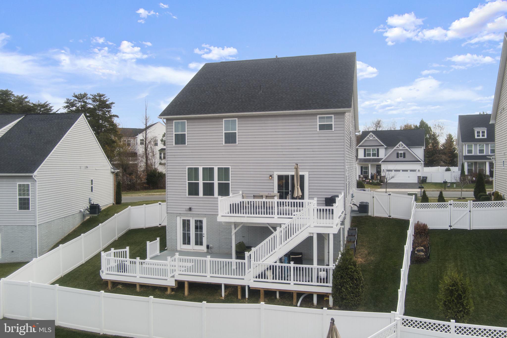 12432 Mays Quarter Road Woodbridge, VA 22192 - Photo 89 of 94 a front view of a house with a yard