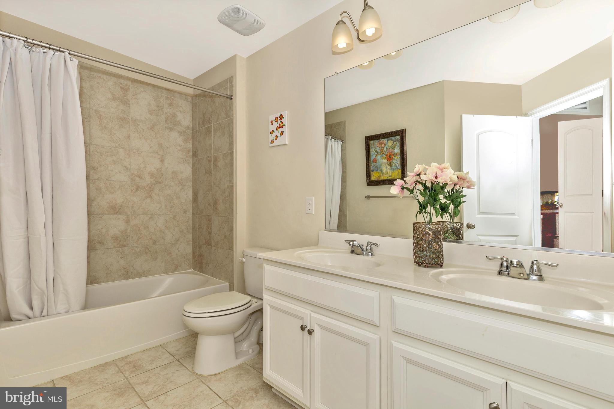 4730 Cambria Road Frederick, MD 21703 - Photo 26 of 42 Ceramic tile full bath serves bedrooms 2 and 3
