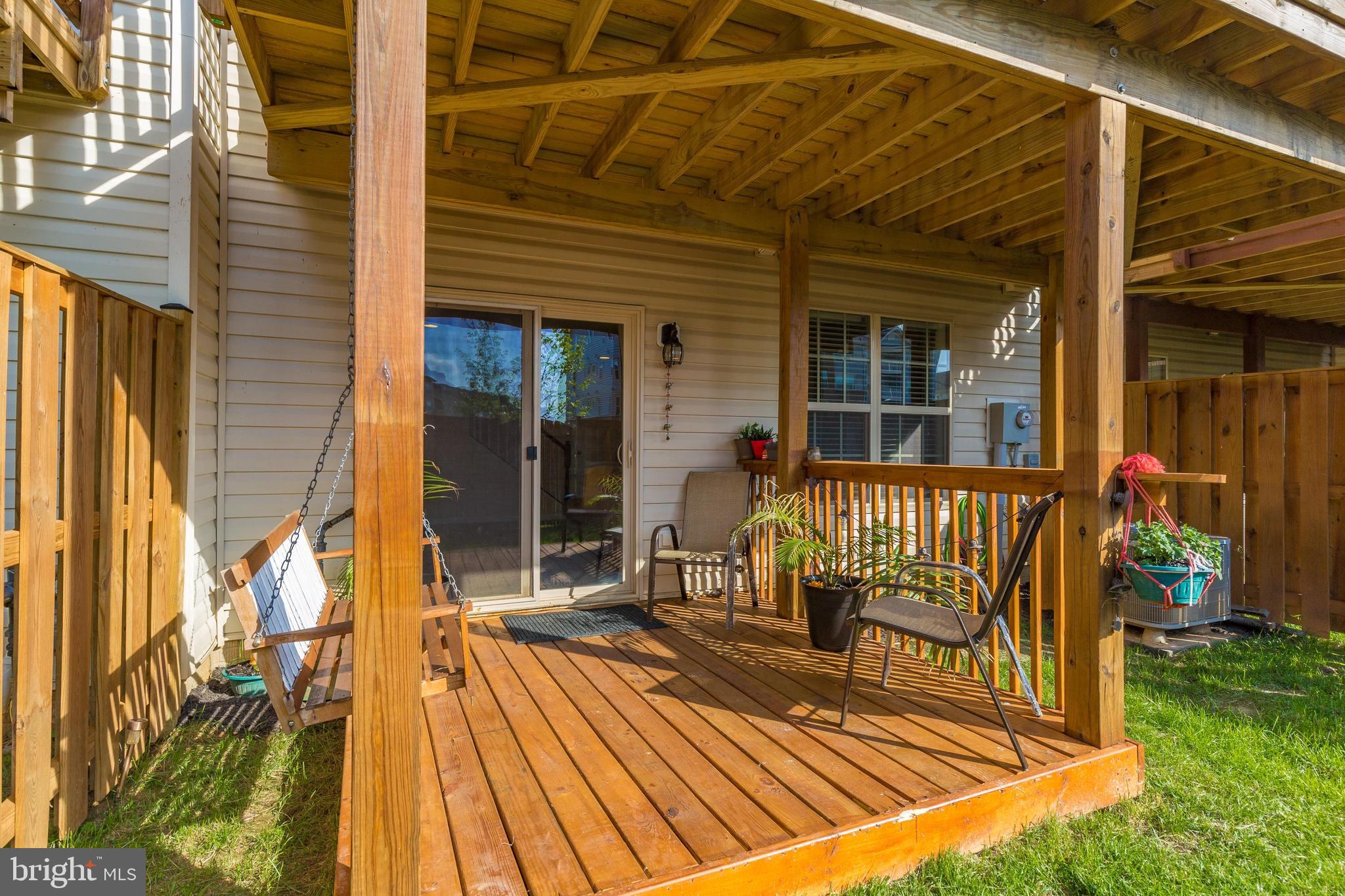 4730 Cambria Road Frederick, MD 21703 - Photo 40 of 42 Covered wood patio and bench swing