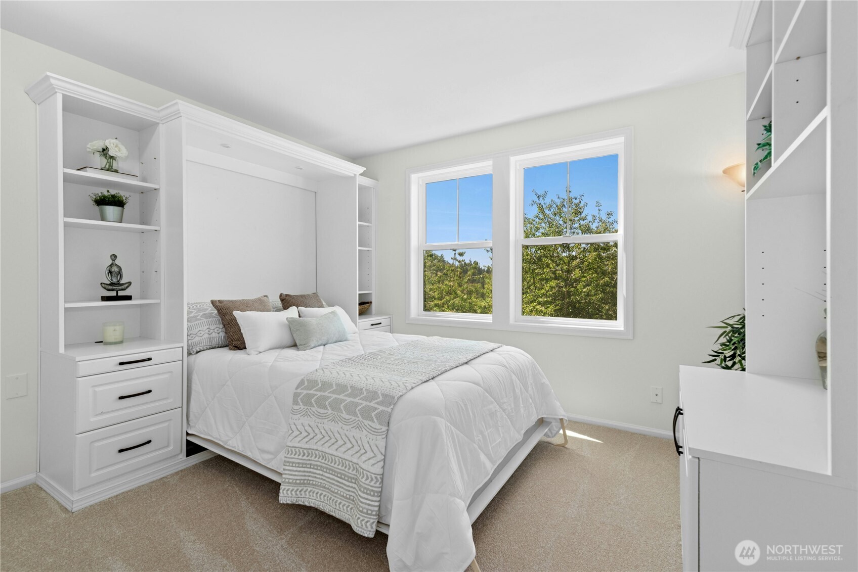 22541 Southeast 42nd Court, Unit 2252 Issaquah, WA 98029 - Photo 15 of 37 a bedroom with a bed and a window