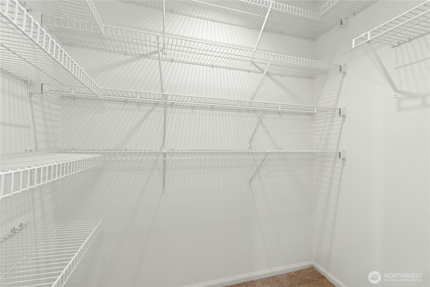 22541 Southeast 42nd Court, Unit 2252 Issaquah, WA 98029 - Photo 20 of 37 a view of a room with racks on the wall