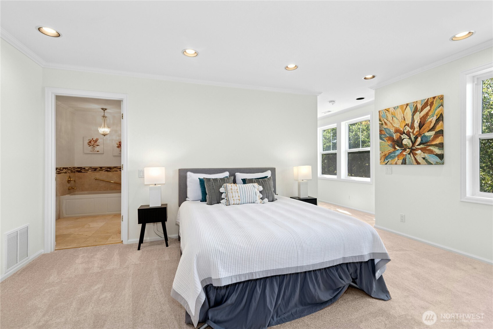 22541 Southeast 42nd Court, Unit 2252 Issaquah, WA 98029 - Photo 22 of 37 a bedroom with a bed and a painting on the wall