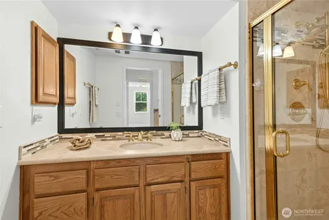 a bathroom with a sink and a mirror