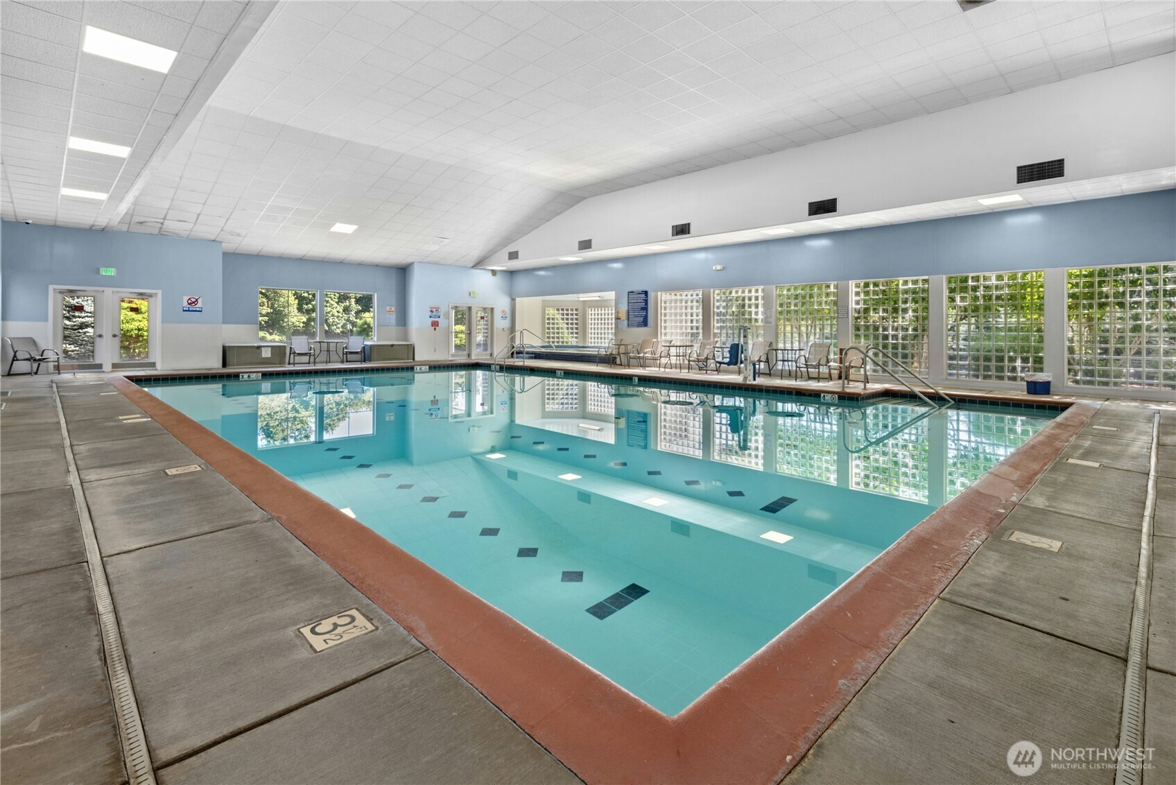 22541 Southeast 42nd Court, Unit 2252 Issaquah, WA 98029 - Photo 35 of 37 a view of a swimming pool kitchen from a balcony