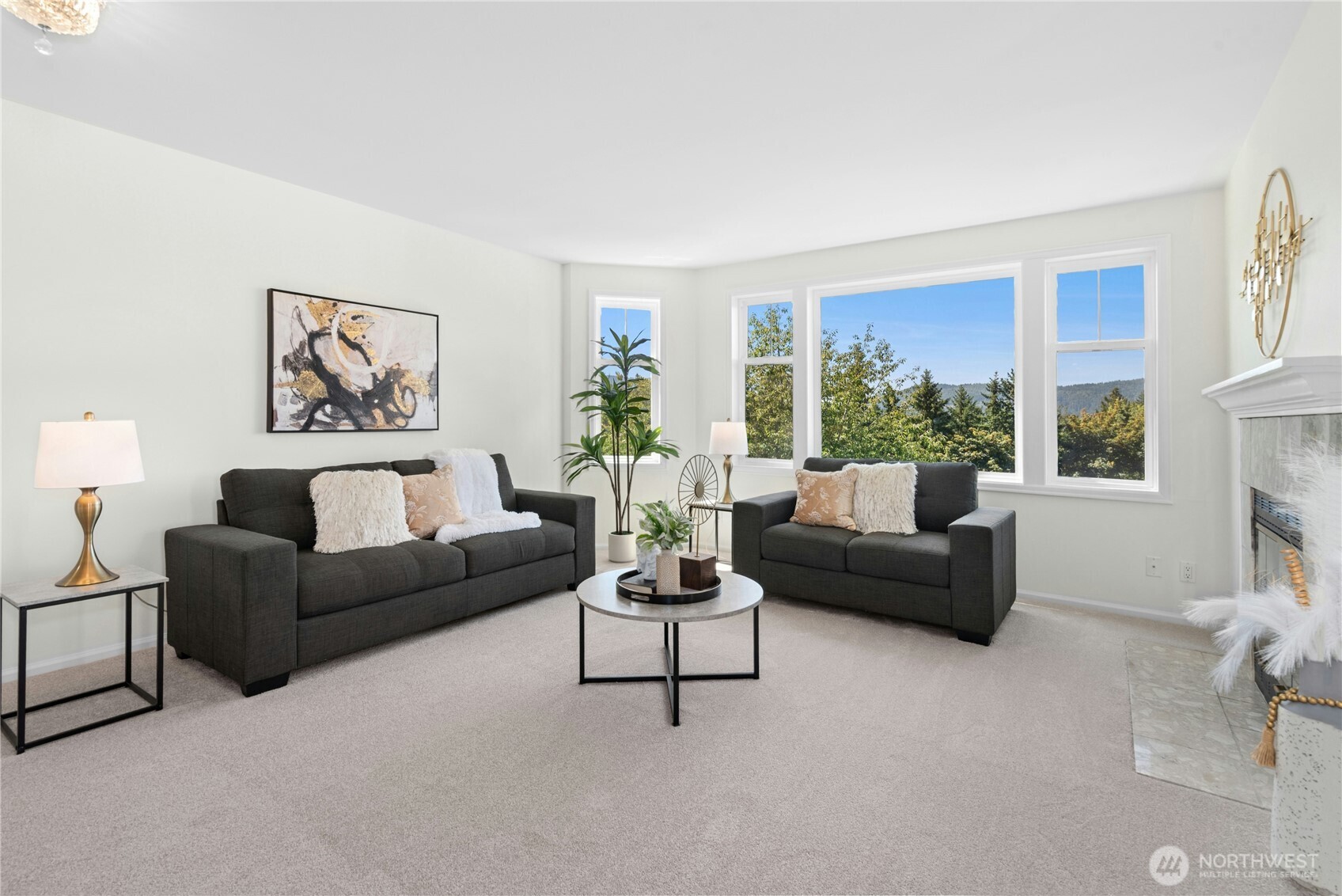 22541 Southeast 42nd Court, Unit 2252 Issaquah, WA 98029 - Photo 8 of 37 a living room with furniture and a large window