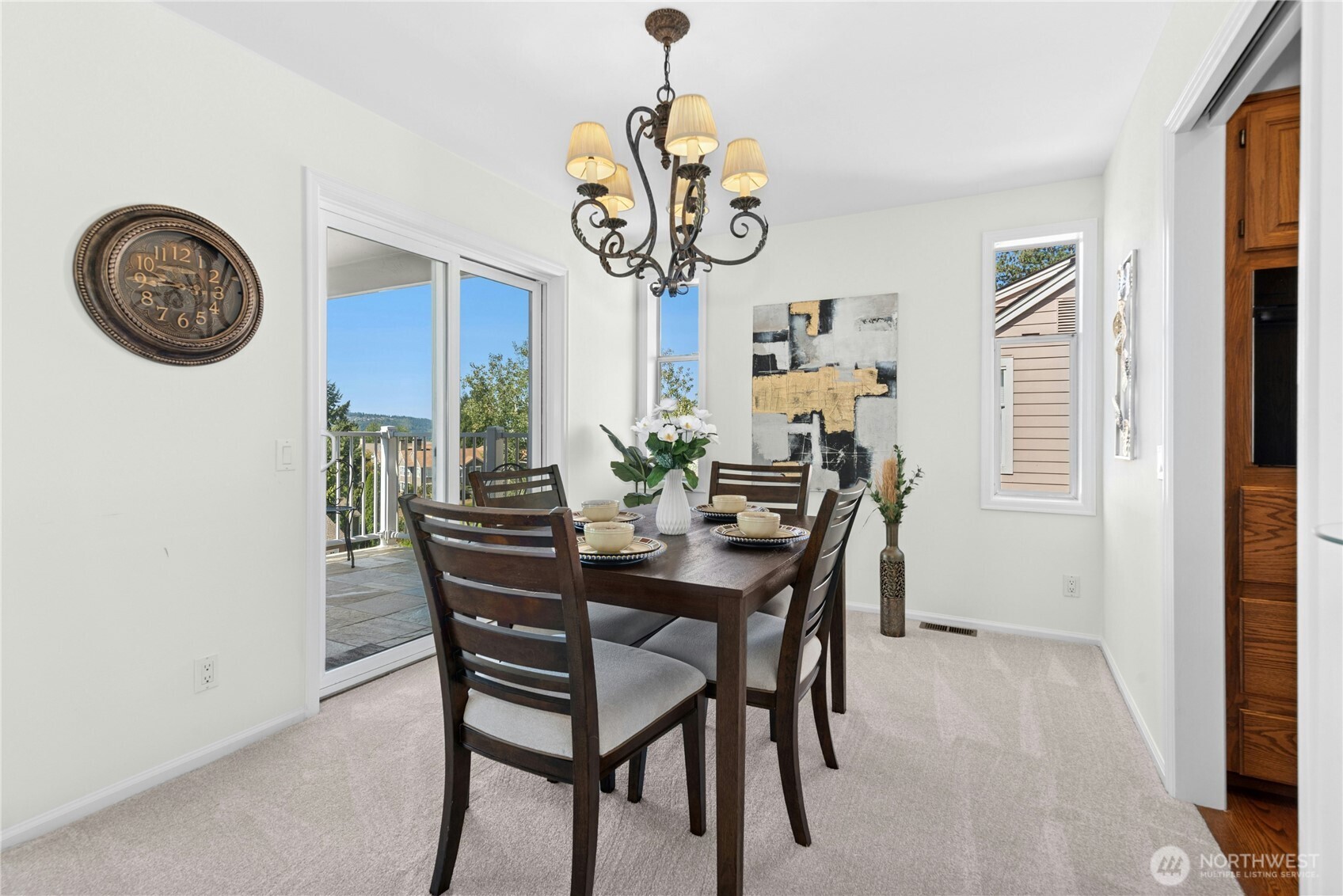 22541 Southeast 42nd Court, Unit 2252 Issaquah, WA 98029 - Photo 9 of 37 a view of a dining room with furniture and a window