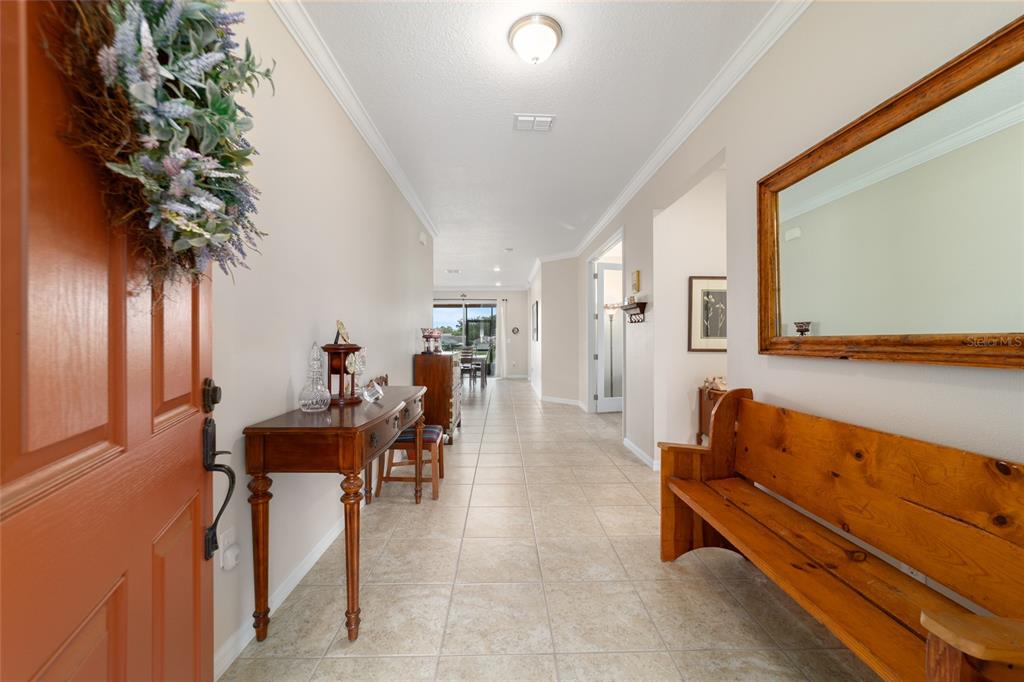 9236 Southwest 91st Ct Road Ocala, FL 34481 - Photo 14 of 48 a living room with furniture and a potted plant