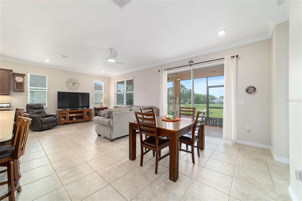 9236 Southwest 91st Ct Road Ocala, FL 34481 - Photo 17 of 48 a view of a dining room with furniture window and outside view