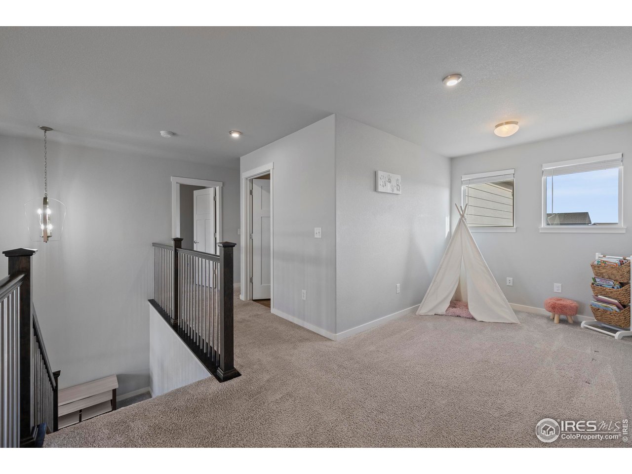7142 Cottage Court Timnath, CO 80547 - Photo 15 of 29 Upstairs Loft/Playroom
