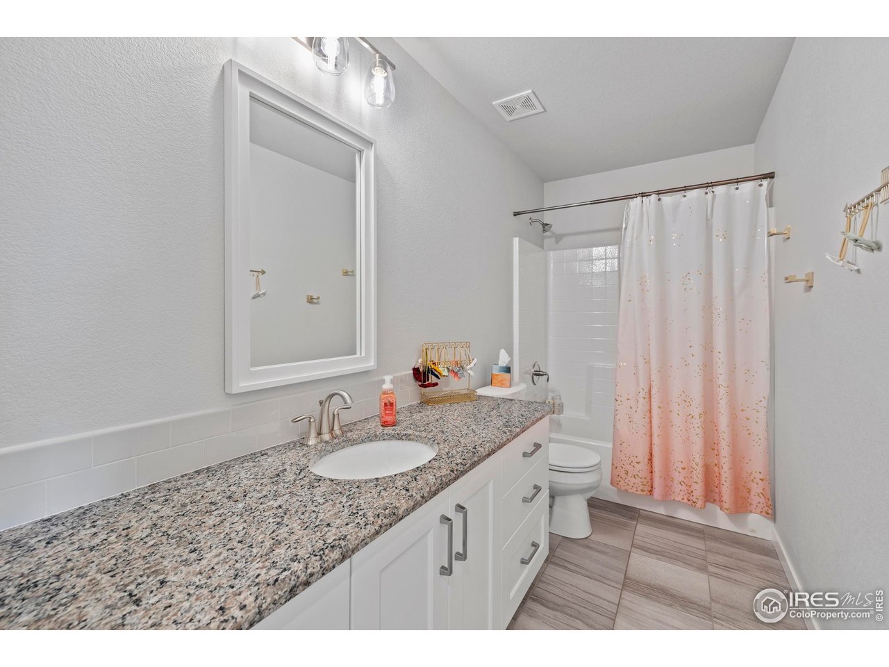 7142 Cottage Court Timnath, CO 80547 - Photo 23 of 29 Secondary Upstairs bathroom