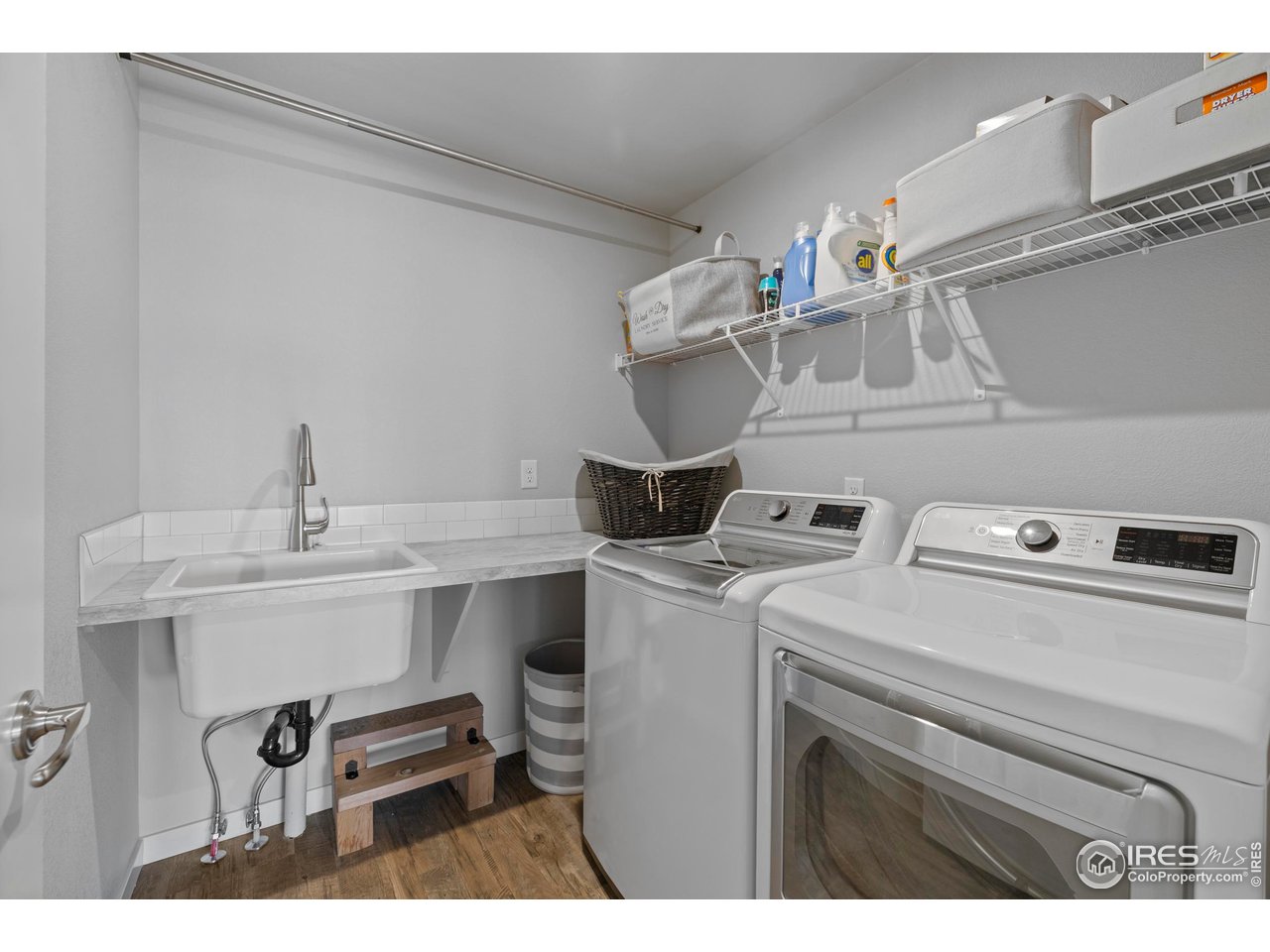7142 Cottage Court Timnath, CO 80547 - Photo 24 of 29 Upstairs Laundry Room with utility sink