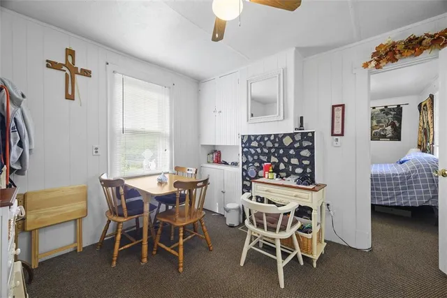 a bathroom with a toilet and a sink
