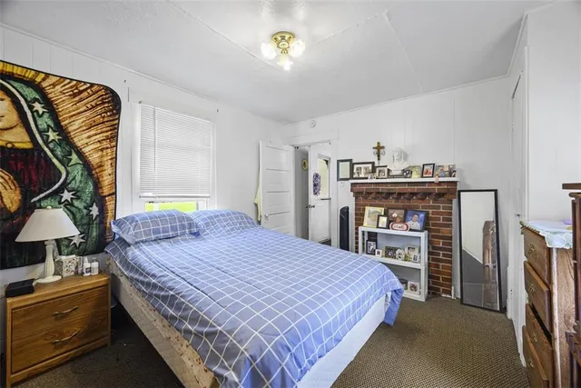 a bathroom with a sink toilet and mirror