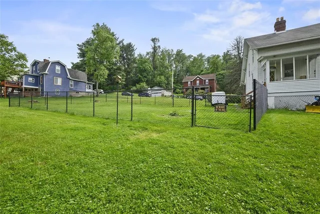 a view of a backyard with a garden