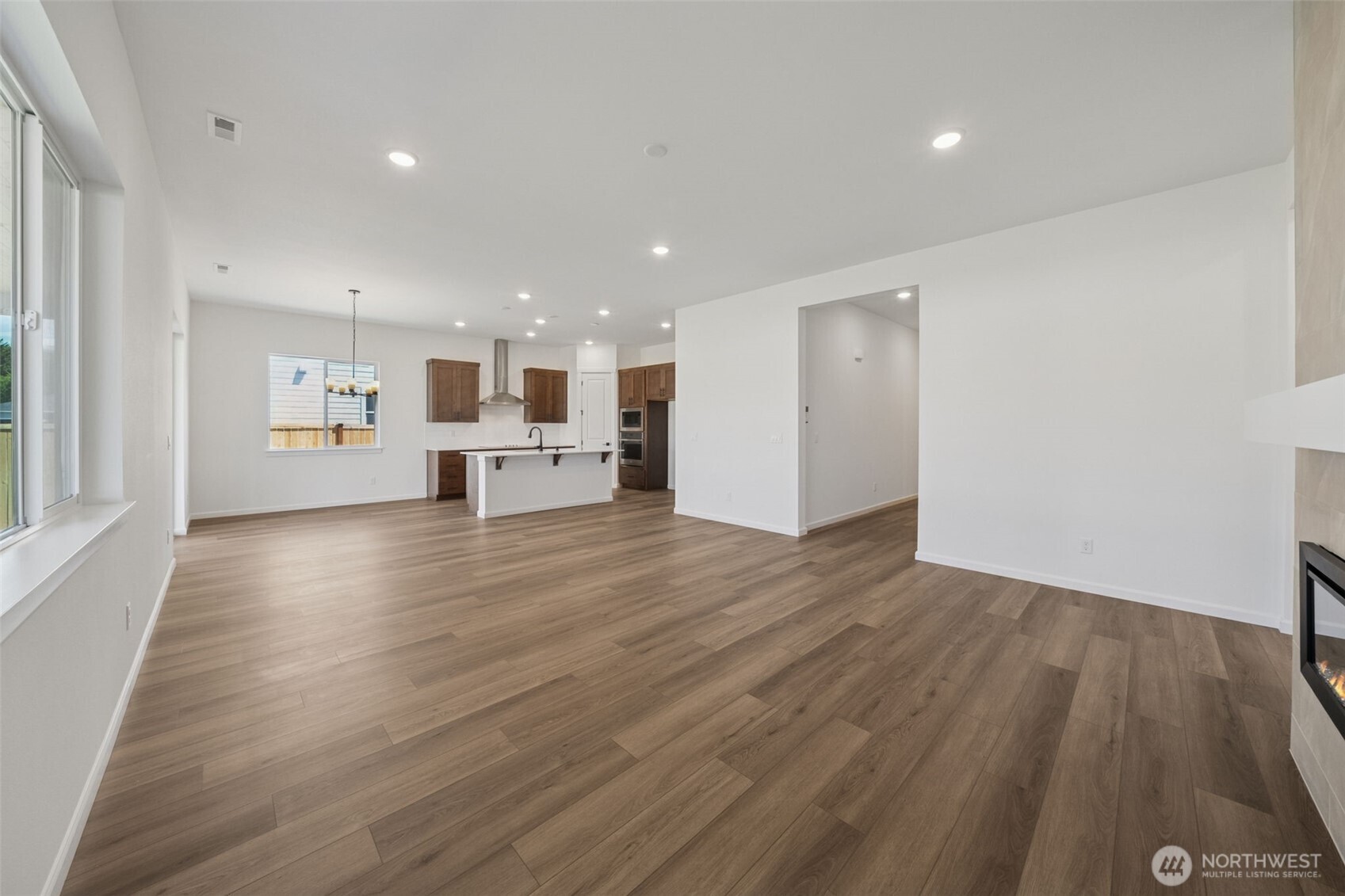 932 Lucas Avenue, Unit 21 Buckley, WA 98321 - Photo 11 of 30 a view of kitchen with furniture and wooden floor
