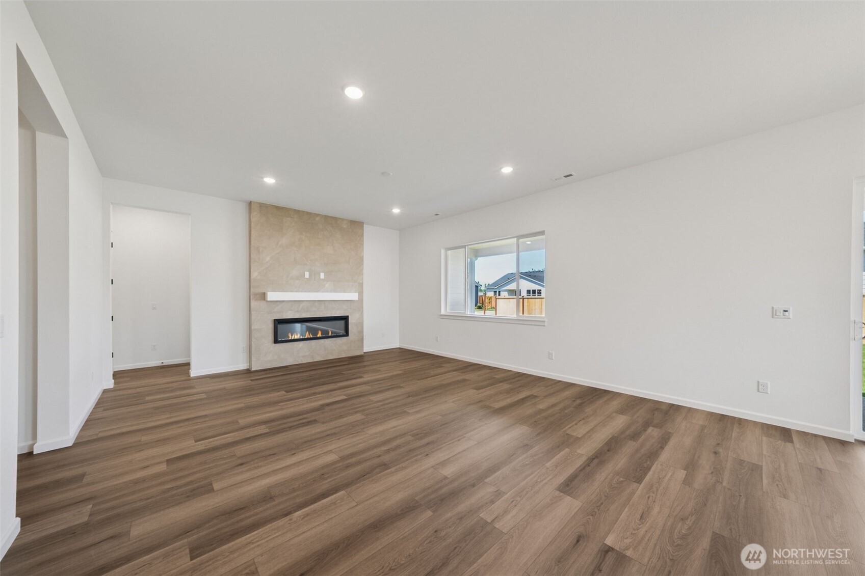 932 Lucas Avenue, Unit 21 Buckley, WA 98321 - Photo 14 of 30 a view of empty room with wooden floor